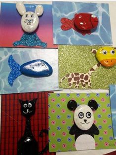 four different animal magnets are shown on a table