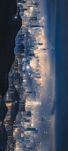 an aerial view of the city lights at night