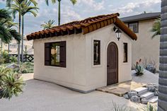 a small white house with a brown roof and tiled roof, surrounded by palm trees