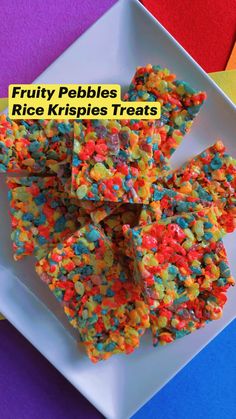 fruity pebbles rice krispy treats on a white plate with colorful background