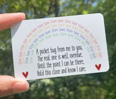 someone is holding up a card with the words in different colors and phrases on it