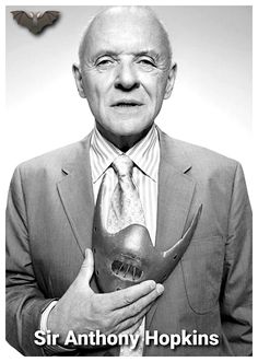 an older man in a suit and tie holding a bird statue with the caption sir anthony hopkins