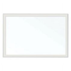 an empty white frame on a white wall