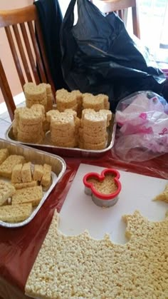 two pans filled with food sitting on top of a table