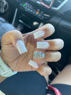 White Nails W Glitter, All White Nails With Rhinestones, White Short Nails With Rhinestones, White Nut Nails, Sparkly White Acrylic Nails, White Nails With Bling, White Nails With Charms, Small Square Nails, Nail Ideas With Glitter