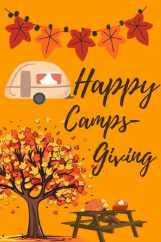 a camper is parked next to a picnic table with leaves on it and the words happy