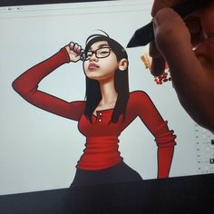 a drawing of a woman wearing glasses on a computer screen