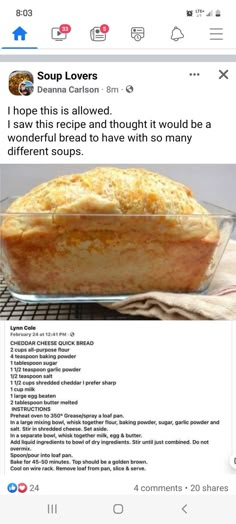 a loaf of bread sitting on top of a table next to a glass pan filled with food