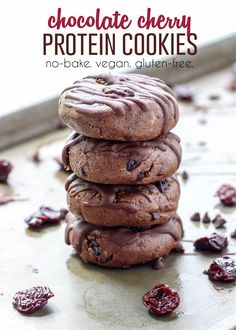 chocolate cherry protein cookies stacked on top of each other