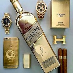 an assortment of cigars, watches and other items