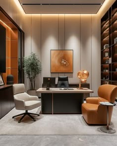 an office with two chairs and a desk in front of a book shelf filled with books