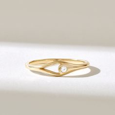 The Diamond Open Bezel Pinky Ring is a remarkable piece of jewelry that effortlessly combines modern minimalism with timeless elegance. Crafted from your choice of 14k, 18k, or 10k solid gold, this statement ring is designed to adorn your pinky finger, making it a subtle yet stylish addition to your everyday look. Features * Made to Order. * Gold KT: 10K, 14K, 18K * Width of Band: 1.56MM * Width of Top: 4.61MM * Thickness of Band: 1.17MM * Custom Gold Color: Rose Gold, Yellow Gold, White Gold * Diamond Color- Clarity: D-E-F color VVS clarity (excellent ideal cut) *Total Ctw: 0.06 ctw * Ready to Ship in 5-7 Business Days ✓ We care about the environment,the jewelry we cast is made with recycled gold. We source exclusively post-consumer material that is refined back to their pure elements to Pinky Ring Women, Modern Everyday Rings With Bezel Setting, Modern Diamond Ring With Bezel Setting For Everyday, Modern Everyday Diamond Ring With Bezel Setting, Minimalist Everyday Diamond Ring With Bezel Setting, Minimalist Everyday Diamond Birthstone Ring, Minimalist 14k Gold Rings With Bezel Setting, 14k Gold Diamond Ring With Si Clarity, Modern Style, Modern 14k Gold Diamond Ring With Si Clarity