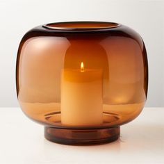 a candle that is inside of a glass vase