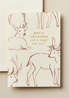 A reindeer print card reading Merry Christmas and a happy new year!. Christmas Envelope Art, Happy Christmas Card, Christmas Card Illustration, Reindeer Card, Christmas Envelopes, Merry Christmas Card Greetings, Watercolor Christmas Cards, Merry Christmas Card, East Sussex