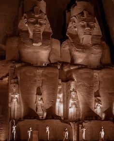 the egyptian statues are lit up at night