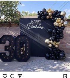 the 30th birthday sign is made out of balloons