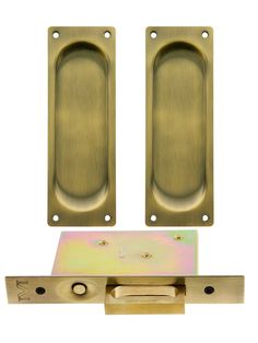 an image of brass door handles and latches