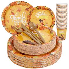 thanksgiving dinnerware set with turkeys giving plates and napkins, forks and spoons