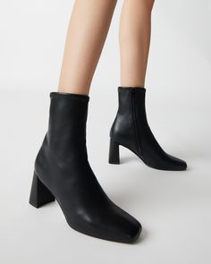 For the perfect seasonal transition style, look no further. HUSH is a sleek ankle boot with a sock-like fit and brings a chic touch to these versatile booties. 2.75 inch heel height 9.5 inch shaft circumference 6.25 inch shaft height Vegan leather or synthetic upper material Textile and vegan leather lining Vegan leather sock Synthetic sole Imported Black Boots Outfit, Steve Madden Store, Sock Boots, Socks And Heels, Leather Socks, Black Square, Boots Outfit, Midi Dresses, Hush Hush