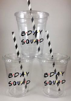 four plastic cups with black and white straws in them that say the one where kate turns 30