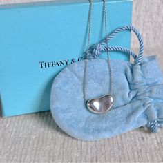 925 Sterling Silver Tiffany & Co Elsa Peretti Bean Necklace Comes With Box And Dust Bag I Can Also Include A Gift Bag, Tissue And Card If You Would Like Bean Necklace, Jewelry Tiffany, Elsa Peretti, Tiffany Co Jewelry, Women Accessories Jewelry, Tiffany & Co., Gift Bag, Womens Jewelry Necklace, Women's Accessories