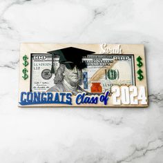 a money bill with the words congrats class of 2012 on it