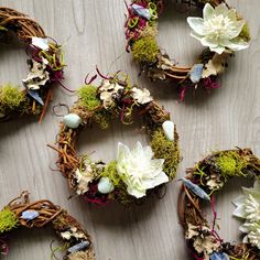 Mini Crystal Wreaths: featuring blue kyanite or amazonite crystals. These adorable decorations were made with real grapevine, preserved moss and lichen (some has been dyed), and tumbled gemstones. They come on gold chain either for the car mirror or wall! Car mirror option comes with a clasp like a necklace. You're welcome to request a longer chain, just add your preference in the "note" at checkout! WREATH OPTIONS: Kyanite Kyanite Amazonite Kyanite Kyanite OVERVIEW: Handmade mini crystals wreat Crystal Wreaths, Mini Crystals, Moss And Lichen, Flower Christmas, Mini Wreaths, Preserved Moss, Blue Kyanite, Car Mirror, Dried Flower