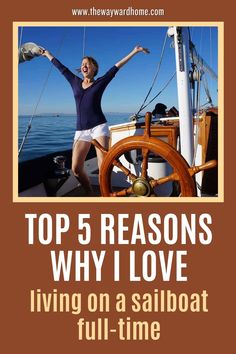 a woman standing on top of a boat with her arms in the air and smiling