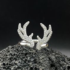 🐬Product Name:Diamond Deer Antler Ring 🐬Gemstone:Zircon 🐬Band Color:White 🐬Style:   Christmas,Anniversary,Party,Gift 🐬Personalized:Yes 🐬Recycled: Yes 🐬Occasion:   Anniversary/Daily/Wedding/Gift/Party/Birthday/Valentine's Day/Engagement/Mother's Day/Father's Day 🐬Metal:Copper 🐬Metal Color:White Silver 🐬Style:   Art Decor,Dainty,Charming,Elegant 🐬About Size:Height: about 1.72 cm Thick: about 0.15 cm Width: about 0.26 cm We can provide personalize ring sizes of 7-12 US size# if you need other sizes# please contact customer service in advance to customize for you# thank you Personalized：Our rings can be engraved with your custom name# or a date that is Commemorative significance special to you 💎About customize Jewelry💎 1. Tell the customer service the customized jewelry material# Deer Horn Ring, Deer Antler Ring, Horn Ring, Deer Horn, Antler Ring, Year Anniversary Gifts, Gift Art, Handmade Rings, Personalized Rings