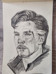 a pencil drawing of a man's face