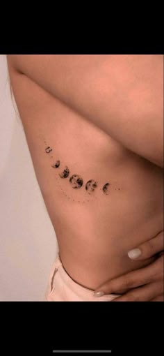 a woman's stomach with the word love written in small letters on her side