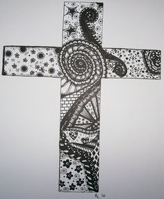 a drawing of a cross with flowers and swirls on the bottom, in black and white