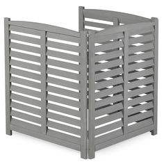 a gray wooden fence with slats on the top and bottom part, in front of a white background