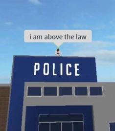 a sign that says i am above the law on top of a police station building