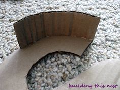 an open cardboard box sitting on top of a carpet