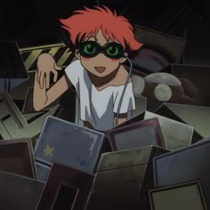 an anime character with red hair and green eyes surrounded by other items in the background