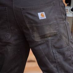 Legendary Carhartt durability meets everyday comfort with these men's work pants. They're crafted with pre-washed twill for a softer feel. An assortment of utility pockets and a hammer loop keep essential tools handy, while our relaxed fit maintains enough room in the seat and thighs for all-day comfort. Features9.25-ounce, 100% cotton ringspun peached twillMore room to move with a comfortable fit through the seat and thigh and a straight leg openingStrong sewn-on-seam belt loopsMultiple tool an Men’s Carhartt Pants, Carhartt Mens Fashion, Carhartt Cargo Pants, Carhartt Work Pants, Carhartt Cargo, Carhartt Mens Pants, Mens Work Pants, Painters Pants, Cargo Pants Outfit