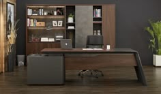 an office desk with a laptop on it in front of a bookcase and bookshelf