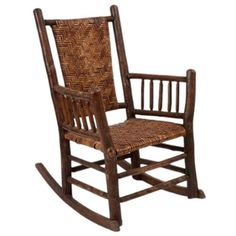 a wooden rocking chair with woven seat