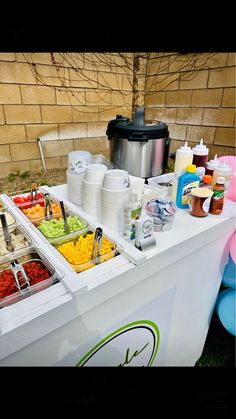 a buffet table with many different foods on it