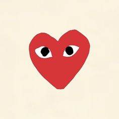 a red heart with two eyes and one eye is drawn on the side of it