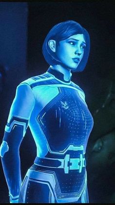 a woman in a futuristic suit standing with her hands on her hips