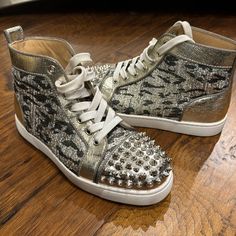 Christian Louboutin Spiked Sneakers Silver Tweed Like Print, With Metallic Silver Leather Trim. Womens Size 36 (Runs Big) Gently Worn, But Almost Perfect Condition Custom Silver Leather Sneakers With Round Toe, Silver Lace-up Custom Sneakers With Rubber Sole, Spiked Sneakers, Luxury Low-top Sneakers With Rhinestone Rivets, Silver Lace-up Sneakers With Vulcanized Sole, Silver Christian Louboutin Heels, Louboutin Sneakers, Christian Louboutin Sneakers, Almost Perfect