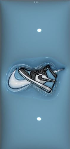 a pair of sneakers floating in the water