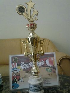 a trophy sitting on top of a table