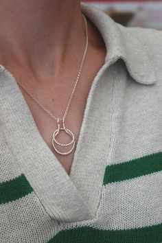 Silver Ring Keeper Necklace for holding your rings whilst you are doing messy jobs, nursing, cleaning or washing your hands. A great way to keep rings on you whilst they aren't on your finger.  The keeper pendant measures 20mm outside diameter at the widest part.  I do recommend checking the inside diameter of your rings before purchase to ensure they are smaller than that diameter. I do advise caution that rings are checked for security (make sure they are smaller than the pendant so they stay Nurse Graduation, Nurse Graduation Gift, Nursing Graduation, Hammered Silver, Chain Lengths, Graduation Gifts, Charm Necklace, Nursing, Silver Ring