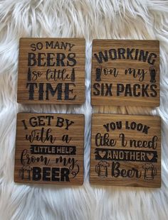 three wooden coasters with different sayings on them