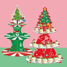 three tiered christmas trees with cupcakes on plates in front of one another