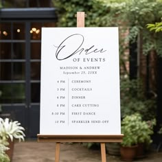 an easel with a sign that says dates of events