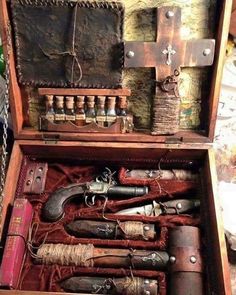 an old wooden box filled with lots of different items